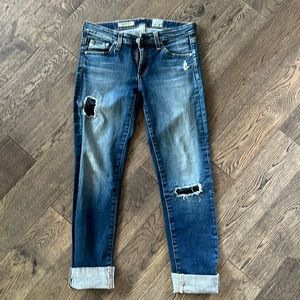 AG the split roll-up/ cigarette roll-up jean. Holes with patches, dark blue